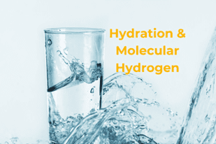 Splashing water filling a clear glass, symbolizing hydration and molecular hydrogen.