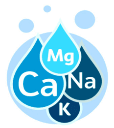 Portrait of a man smiling gently against a teal background.